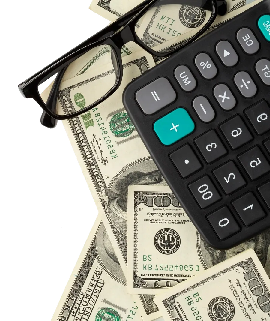Calculator on top of dollar bills